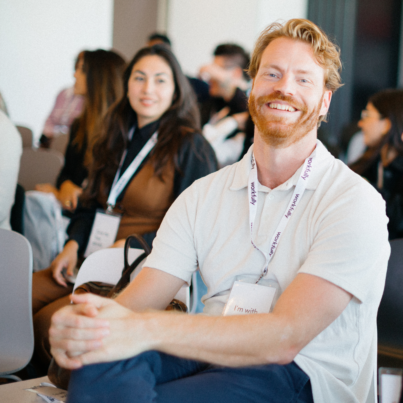 Professionals collaborating at a conference-style meeting