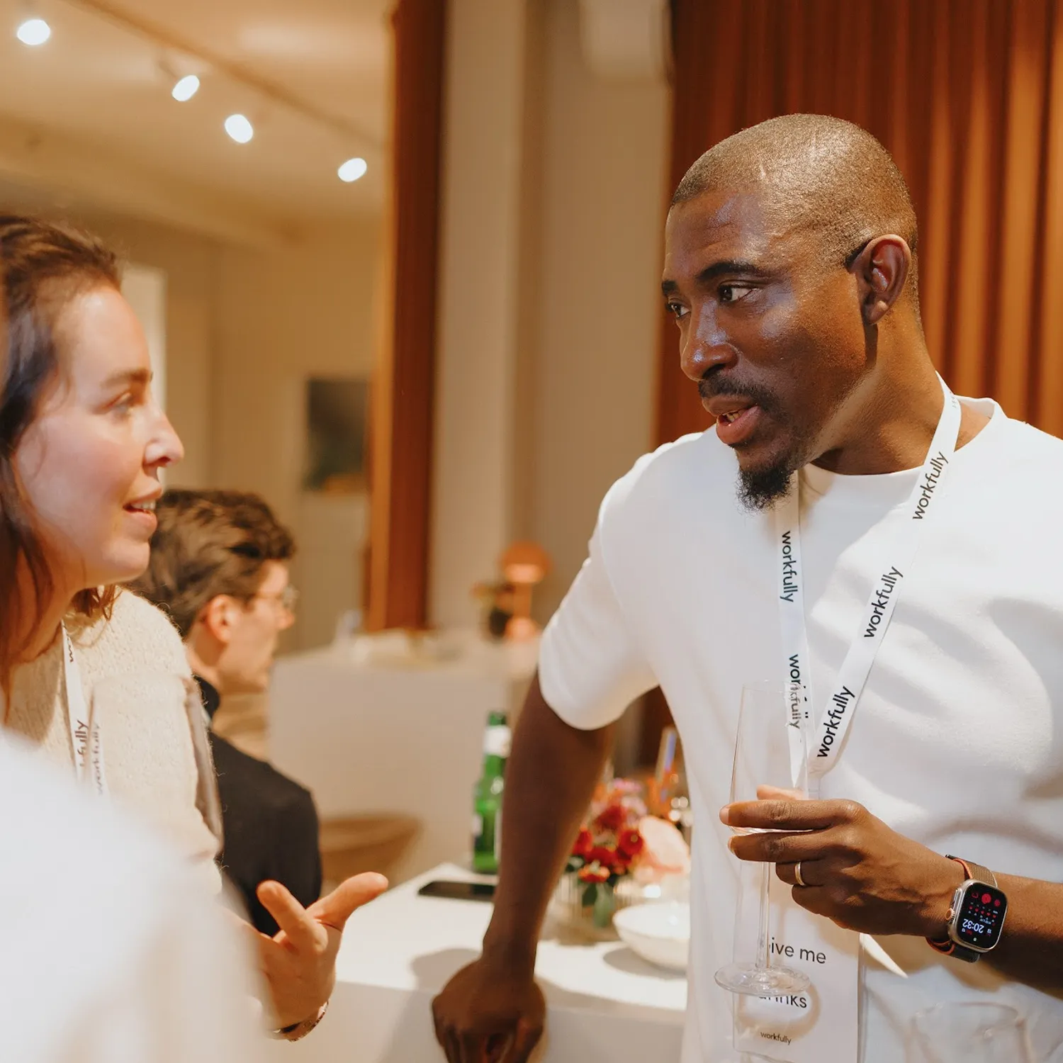 Professionals at a business event with conversation