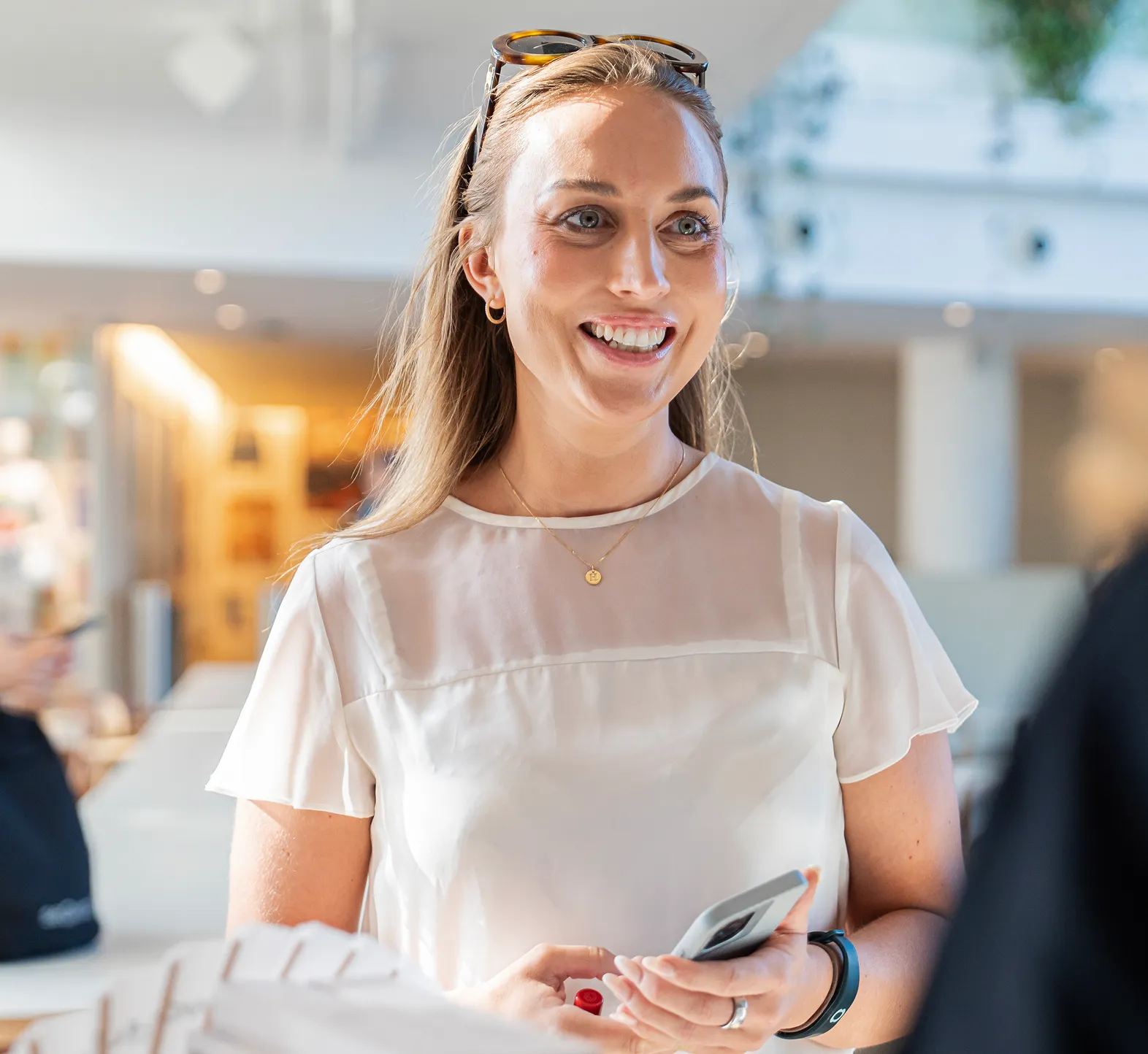 Professional using hiring tools on a laptop in a modern office