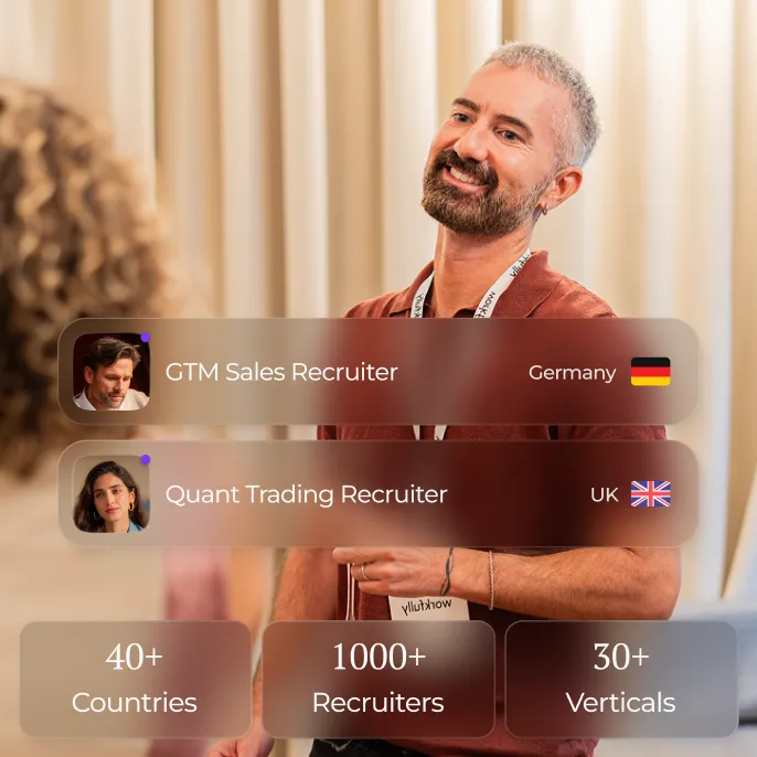 Colleagues collaborating around a laptop