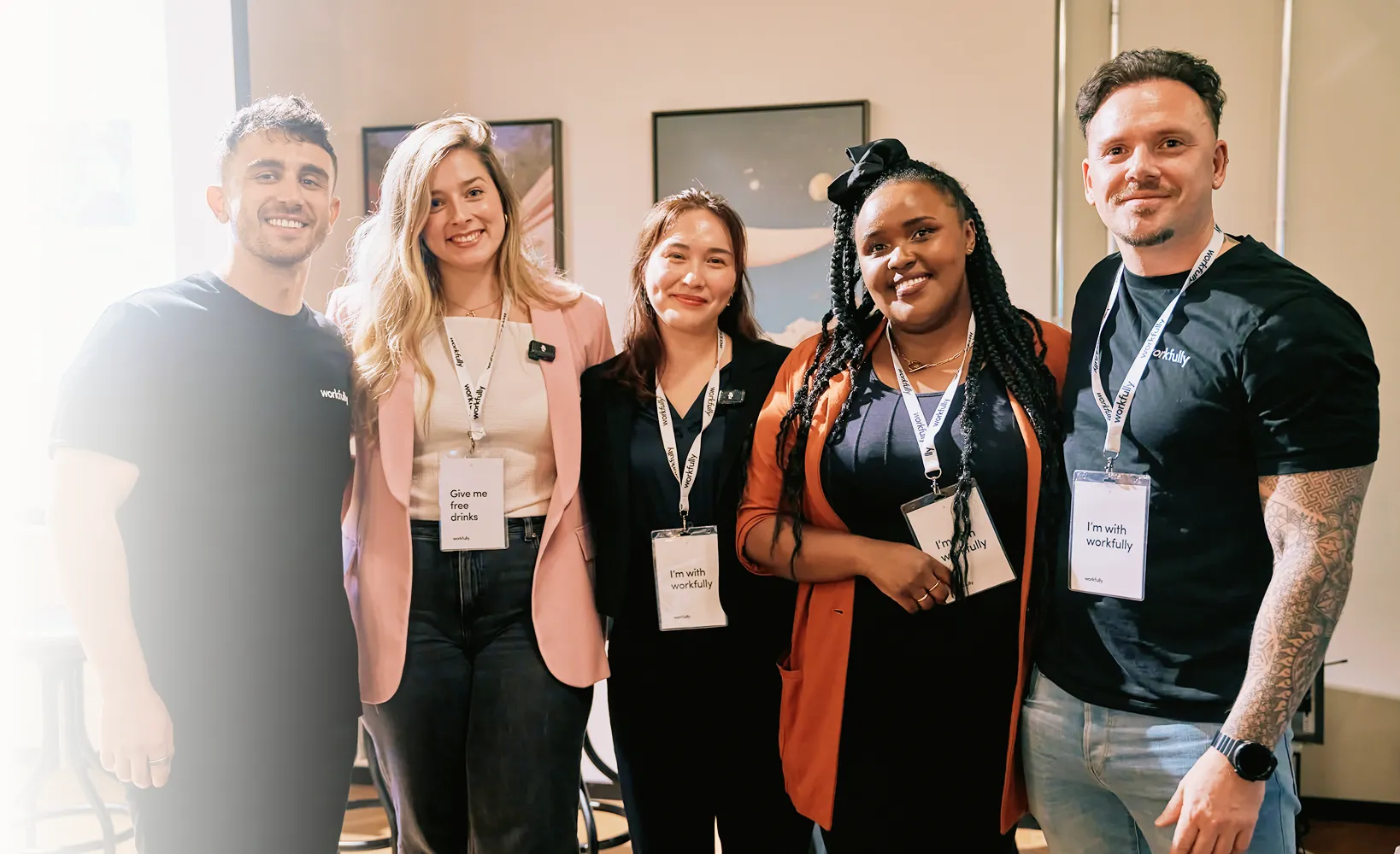 Diverse team collaborating together in a modern workspace